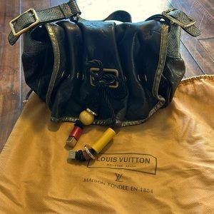 Louis Vuitton, used once, like new with protection bag. Comparison price $1750